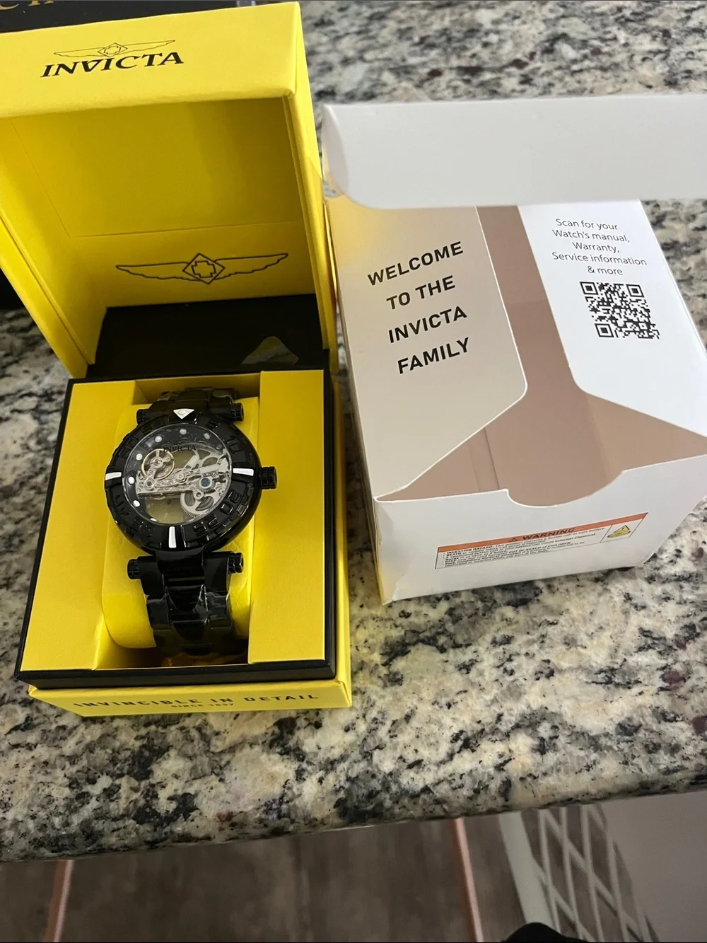 Invicta Black Skeleton Dial Men's Bracelet Watch with Silver Movement Accents